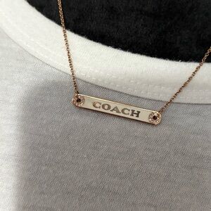 Coach Rose Gold and Cream Logo Bar Necklace